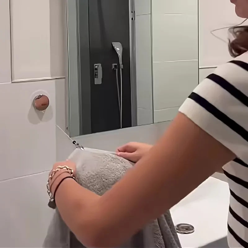 Auto-Retract Adhesive Towel Rack