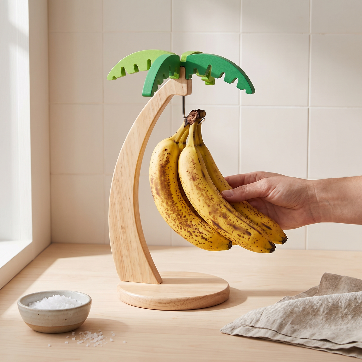 Wooden Banana Hanger with Leaf in use image