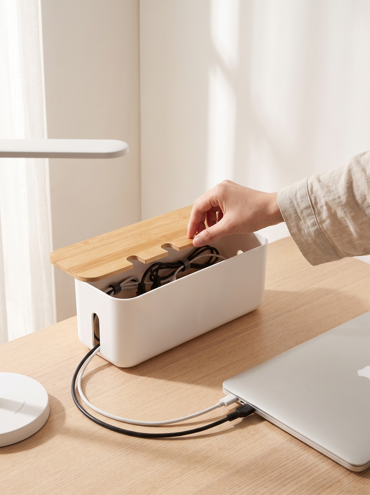 Bamboo lid cable management box on a desk