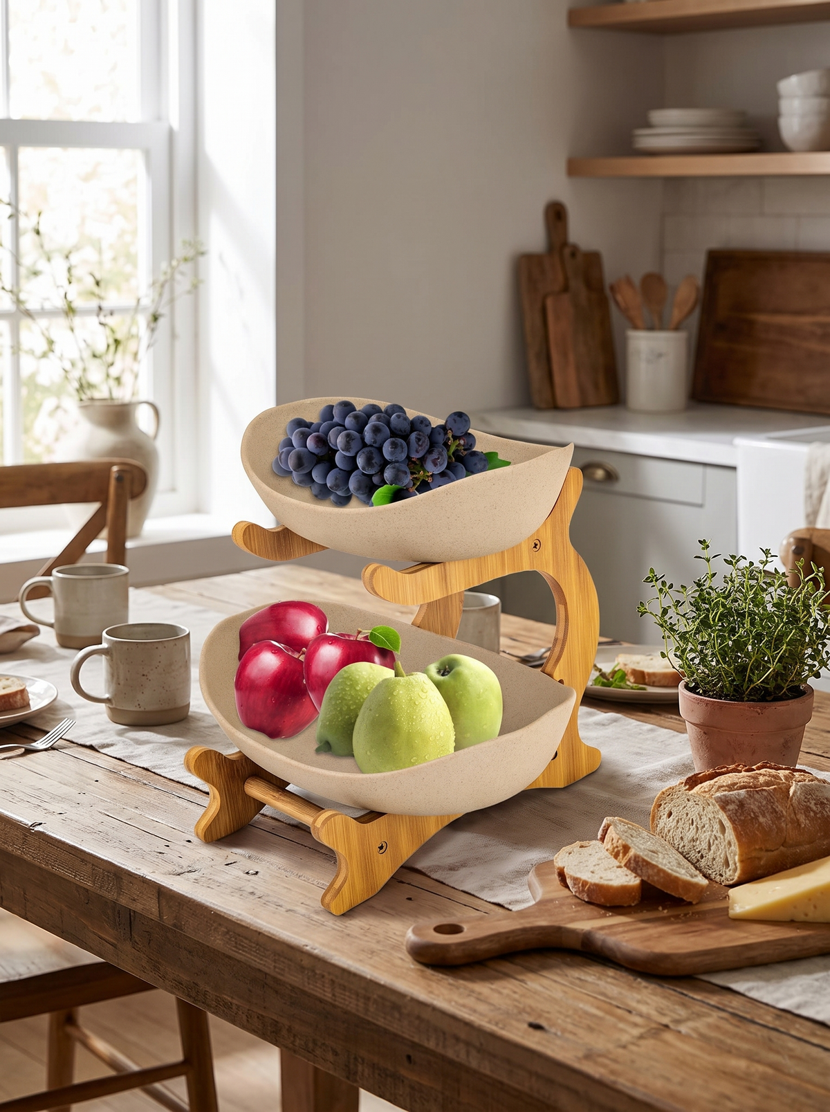 Two pottery bowls on the bamboo stand holding fruit