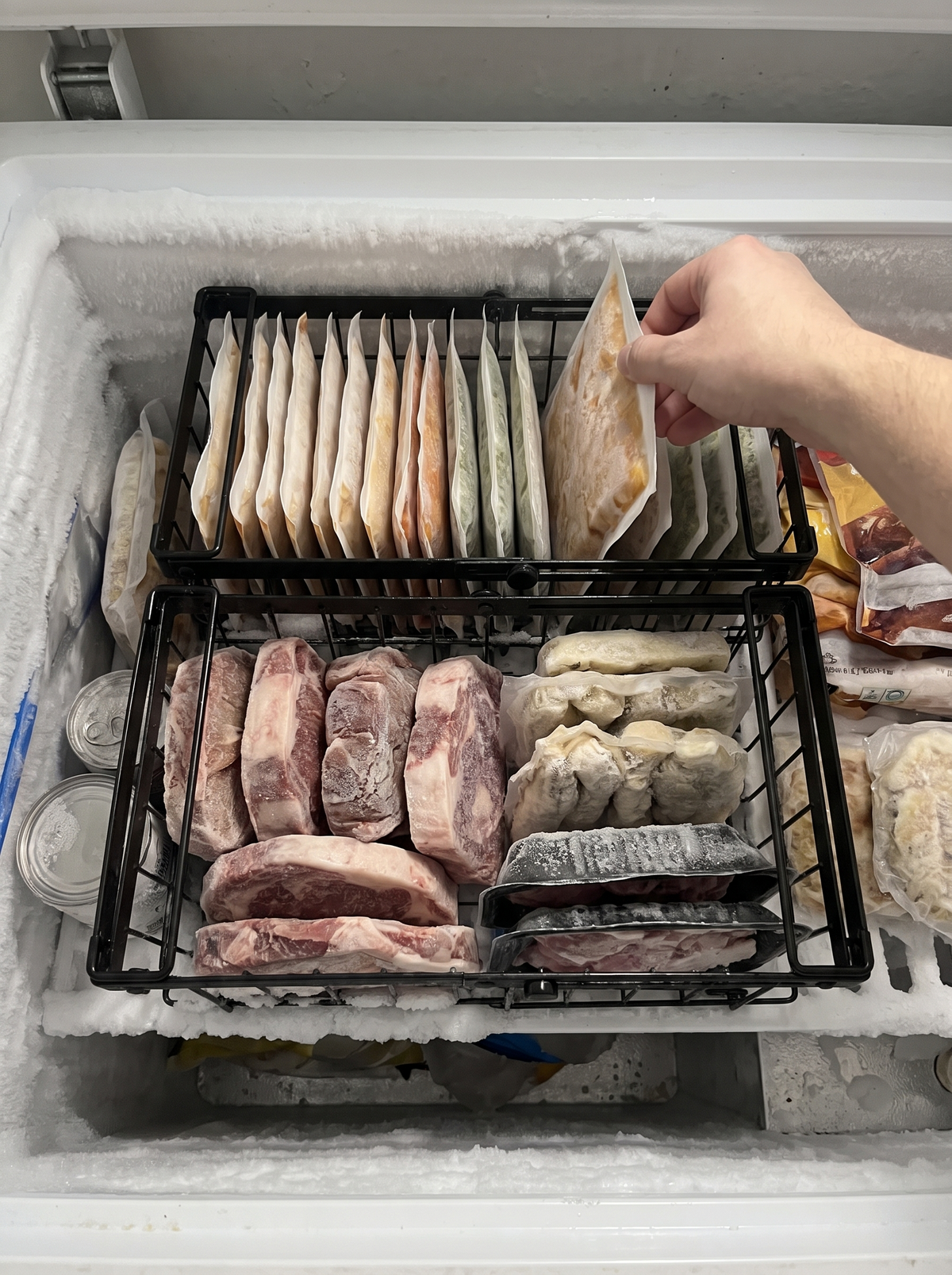 Wire baskets organising a chest freezer